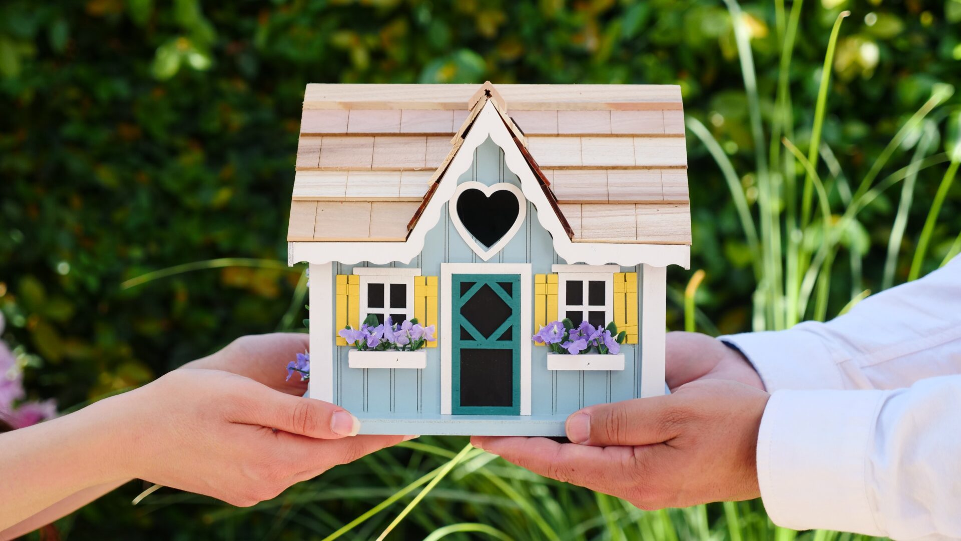 November2 (1) Happy Couples Holding Their Dream House In Their Hands